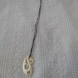 New Zealand carving necklace